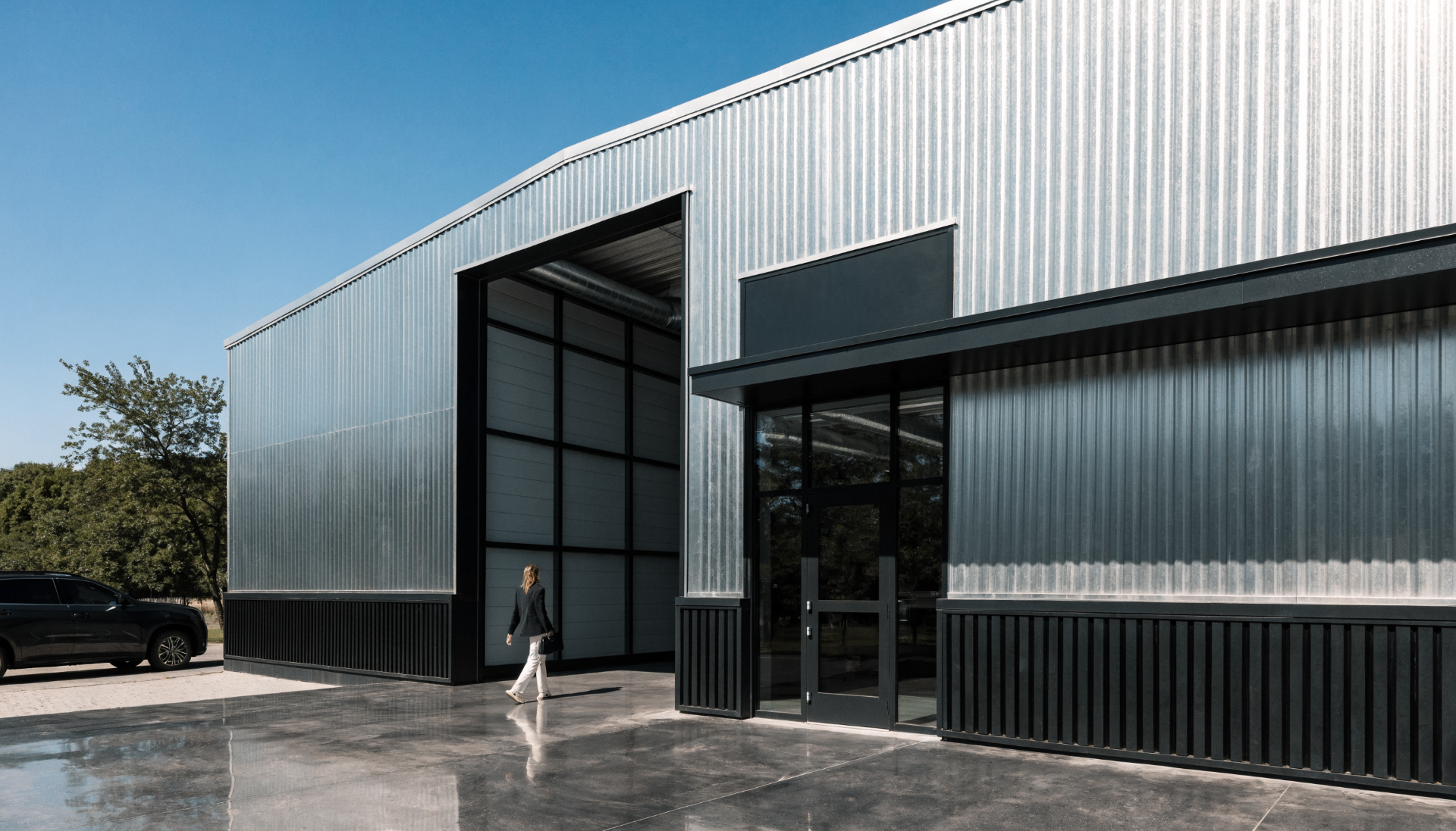 Premium industrial flex / small-bay suite park at golden hour